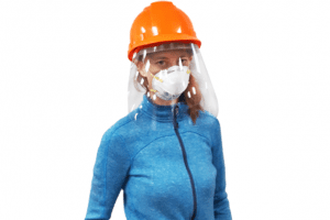 Woman wearing hard hat and face shield